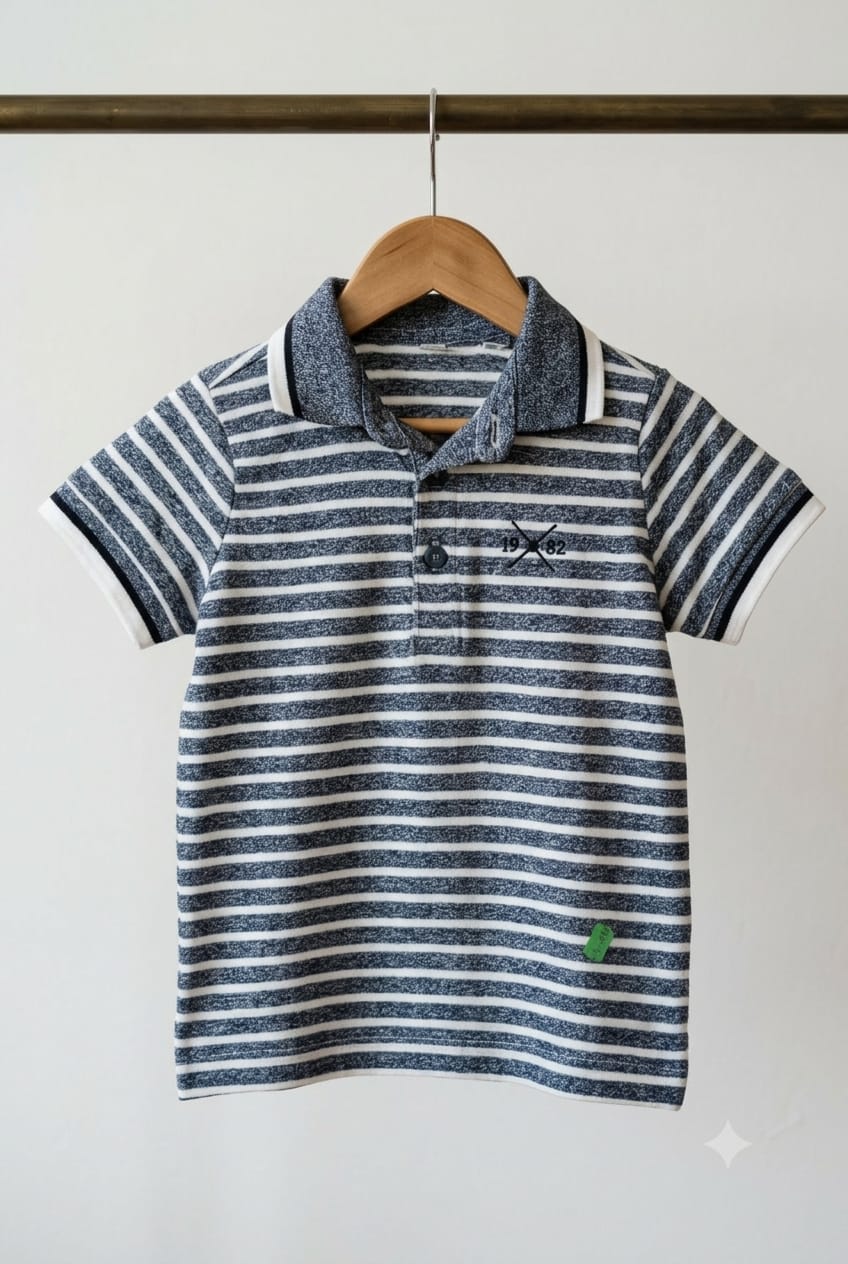 Boys navy striped polo shirt - front view on hanger